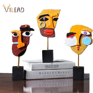 
                  
                    Abstract Face Bookshelf Carving Ornament
                  
                